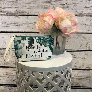 New in packaging super cute cosmetic bag/wristlet